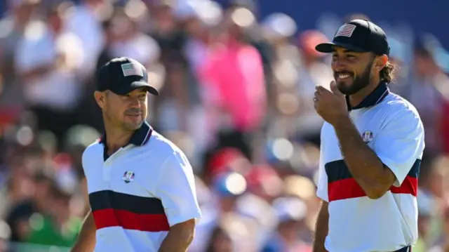 Brian Harman and Max Homa smile after winning their Ryder Cup tie