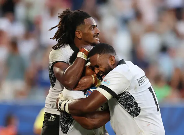 Vinaya Habosi of Fiji celebrates scoring his team's second try with teammate