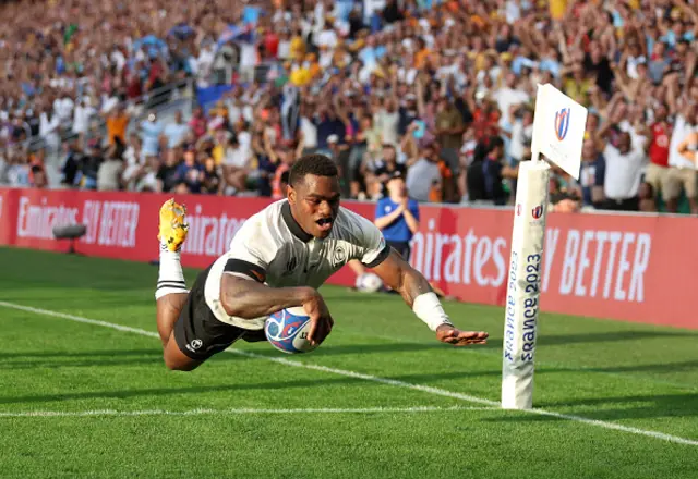 Josua Tuisova of Fiji scores his team's first try