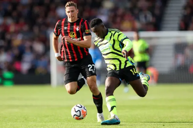 Illia Zabarnyi vies Arsenal's English striker Eddie Nketiah