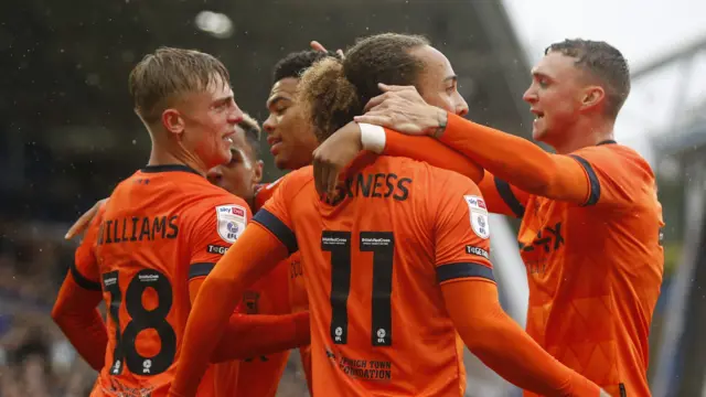 Ipswich celebrate their equaliser at Huddersfield