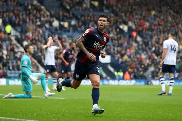 Alex Mowatt celebrates his goal at Preston