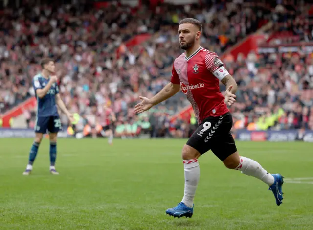 Adam Armstrong celebrates his goal against Leeds