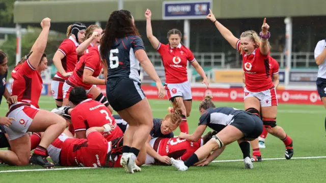 Wales celebrate Keira Bevan's try