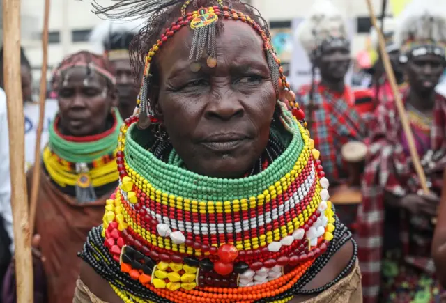 Pastoralists from the Turkana community who are usually affected by drought hold rally in a march dubbed 'The real Africa Climate Summit People's March', held by different civil society groups during a demo in the streets of Nairobi,