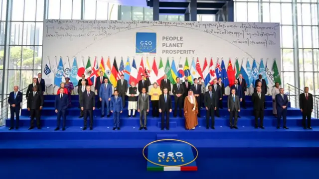 Italian Prime Minister Mario Draghi and other world leaders pose for the family photo on the first day of the Rome G20 summit, on October 30, 2021 in Rome, Italy. The G20 (or Group of Twenty) is an intergovernmental forum comprising 19 countries plus the European Union. It was founded in 1999 in response to several world economic crises.