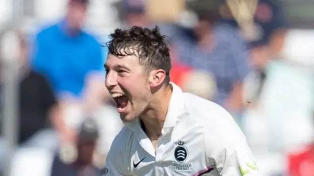 Josh de Caires celebrates taking an Essex wicket