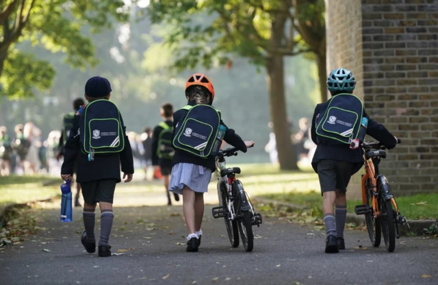 Pupils from Corpus Christi Catholic School, Brixton arrive at St Martin's in the Field Girls' School in London, as they are relocated after their school was affected with sub standard reinforced autoclaved aerated concrete