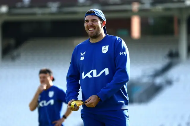 Surrey's Jamie Overton warms up at The Oval