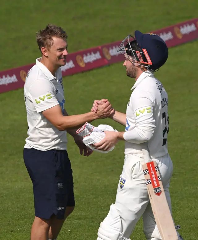 Durham skipper Scott Borthwick with Ollie Robinson