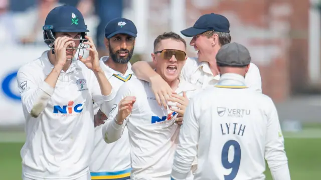 Dom Bess takes the wicket of Wayne Madsen