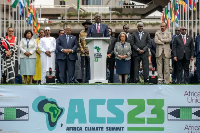 President of Kenya William Ruto (C) surrounded by other African leaders delivers his closing speech during the closure of the Africa Climate Summit 2023 at the Kenyatta International Convention Centre (KICC) in Nairobi on September 6, 2023