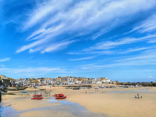 A beach and blue sky