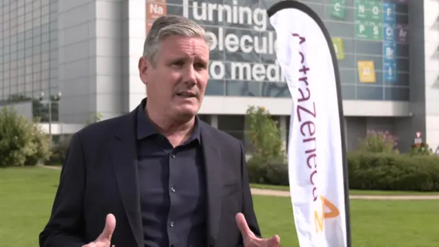 Starmer speaks outside a building