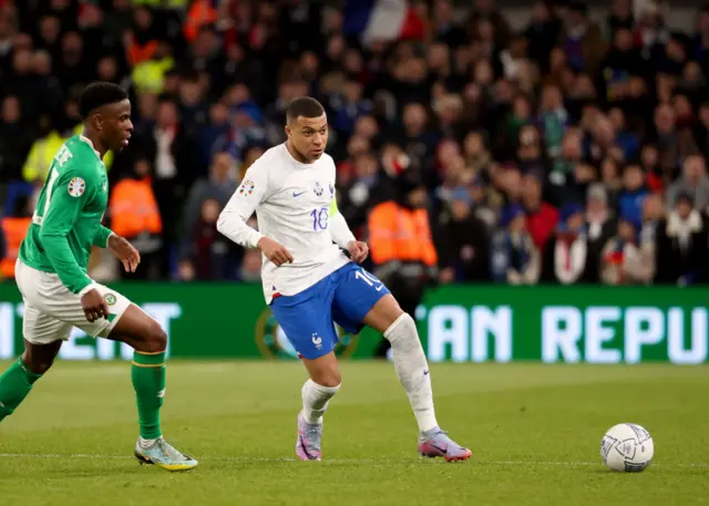 Kylian Mbappe in action for France