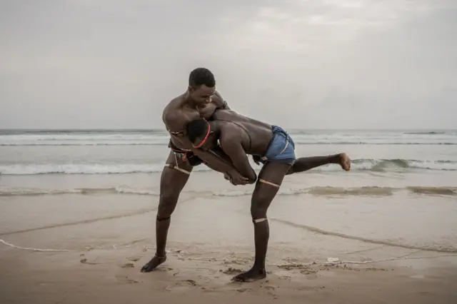 Wrestlers on a beach in Dakar, Senegal