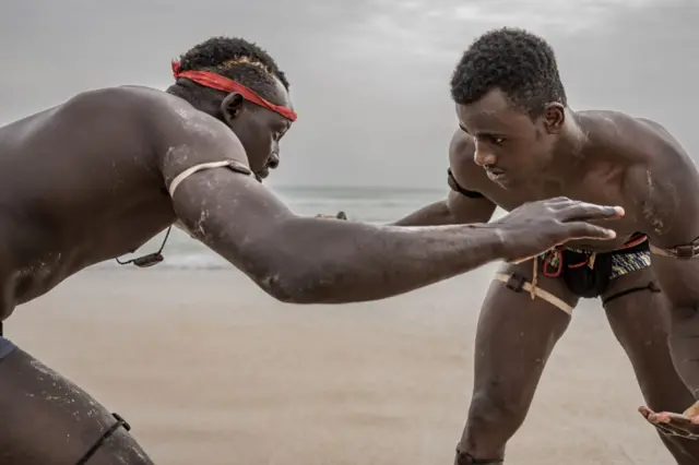 Wrestlers on a beach in Dakar, Senegal