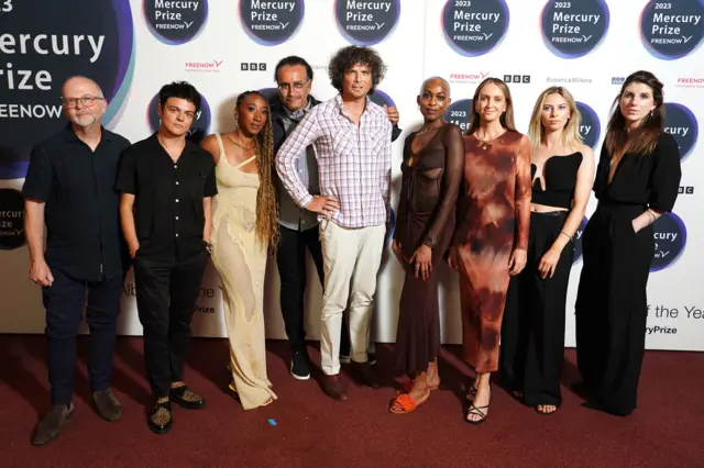 In this photo you can see all of this year's Mercury Prize judges on the red carpet (from left to right): Jeff Smith, Jamie Cullum, Jamz Supernova, Phil Alexander, Will Hodgkinson, Tahepo Mokoena, Lea Stonhill, Sian Eleri and Danielle Perry