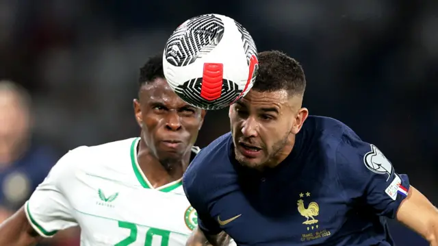 Republic of Ireland's Chiedozie Ogbene and Lucas Hernandez of France