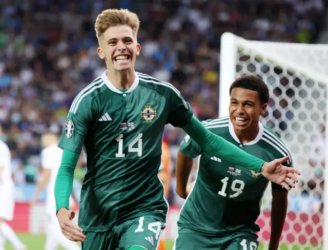 Northern Ireland's Isaac Price celebrates his equaliser against Slovenia