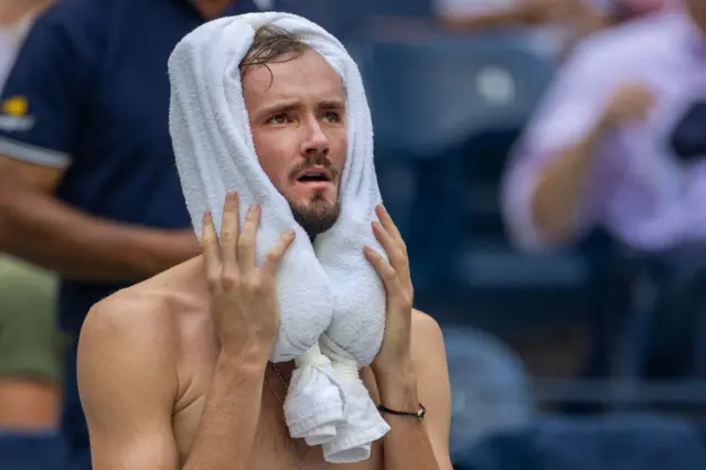 Daniil Medvedev of Russia cools off with an ice pack