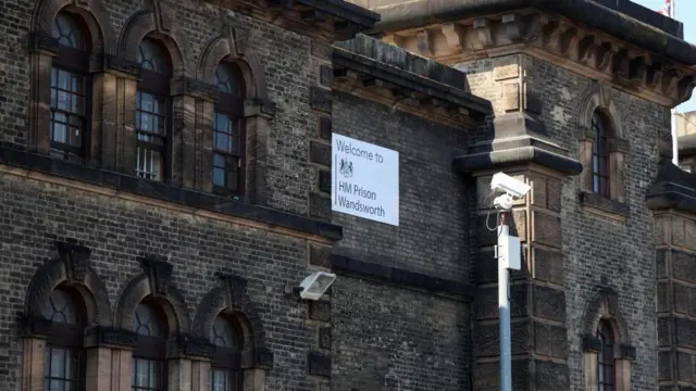 A security camera stationed on exterior of Wandsworth prison