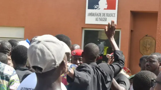 Protesters gather in front of the French Embassy in Niamey during a demonstration that followed a rally in support of Niger's junta in Niamey on July 30, 2023.