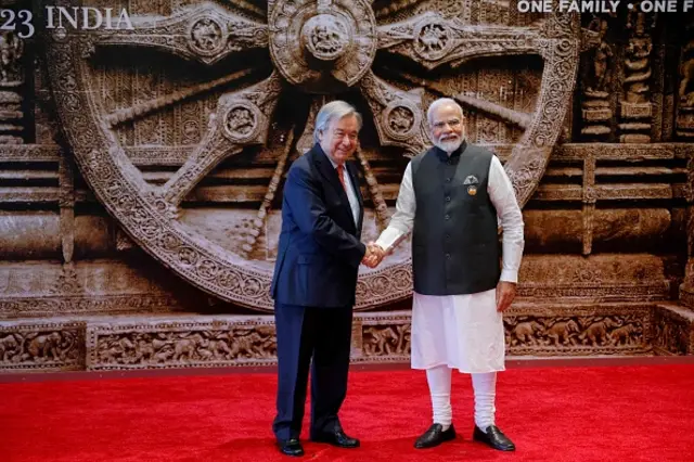 India's Prime Minister Narendra Modi (R) shakes hand with United Nations Secretary General Antonio Guterres