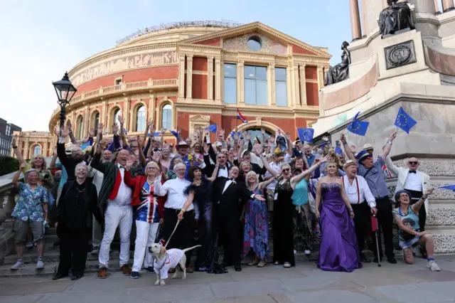 People with UK and EU flags