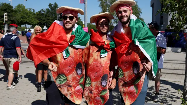 Italy fans dressed as pizzas