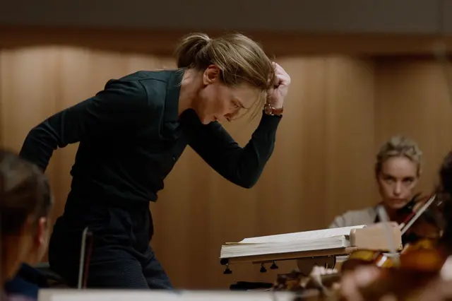 Cate Blanchett conducting in character in the film Tár