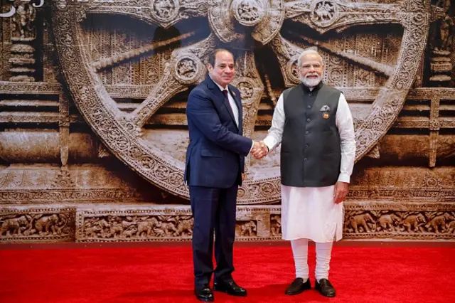 Prime Minister Narendra Modi (R) shakes hand with Egyptian President Abdel Fattah al-Sisi ahead of the G20 Leaders' Summit at the Bharat Mandapam in New Delhi on September 9, 2023