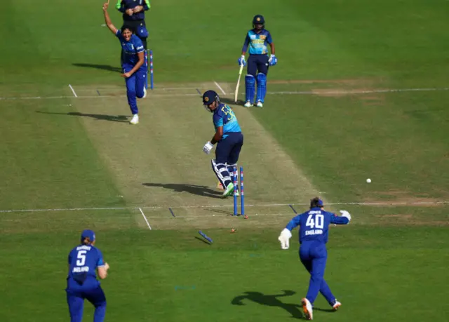 Sri Lanka's Chamari Athapaththu is bowled out by England's Mahika Gaur