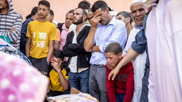 Crowd of people crying