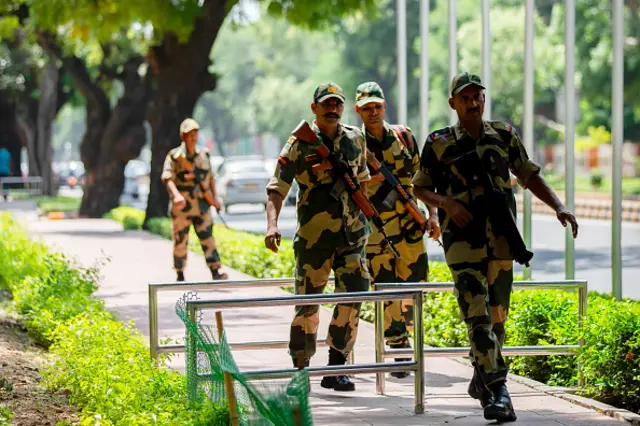 Paramilitary personnel seen walking outside hotels during the rehearsal of security preparations ahead of the G20 Summit, in New Delhi on September 2, 2023