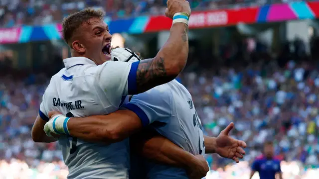 Italy celebrate a try against Namibia