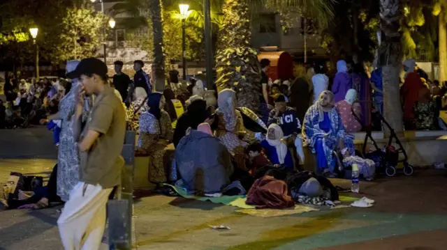 People seek safety outside after an earthquake in Rabat, Morocco, 08 September 2023.