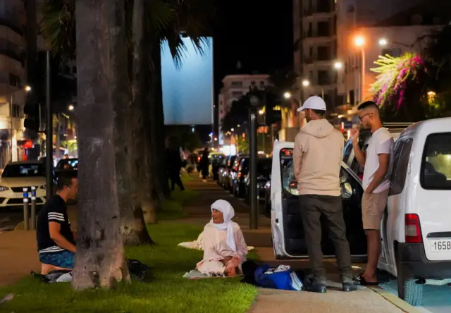 People gather on a street in Casablanca, following a powerful earthquake, 9 September 2023