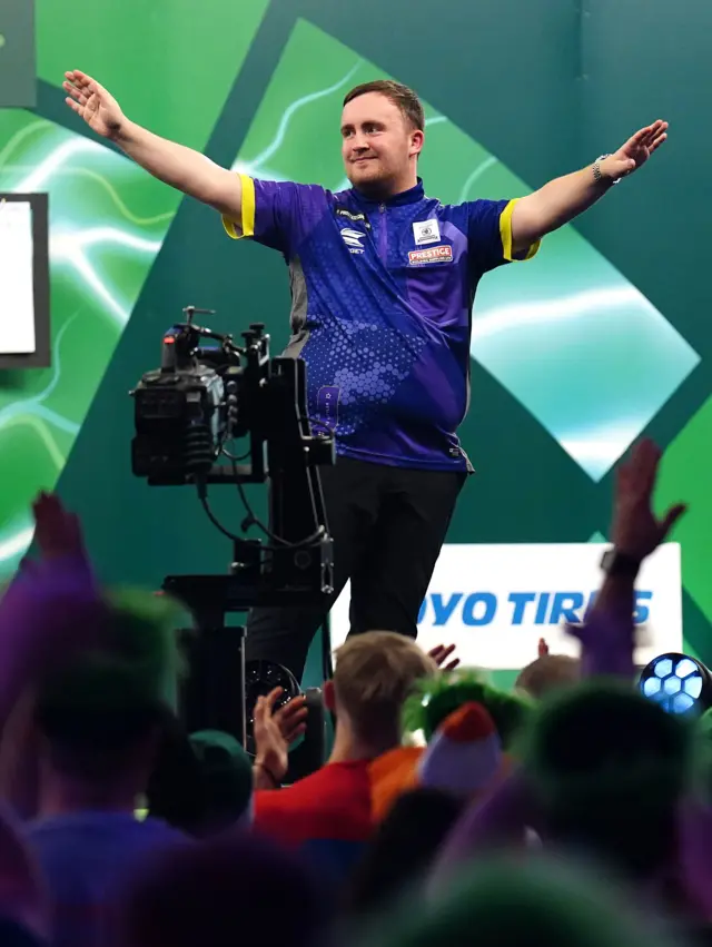 Luke Littler celebrates