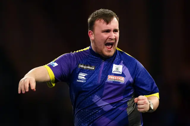 Luke Littler celebrates