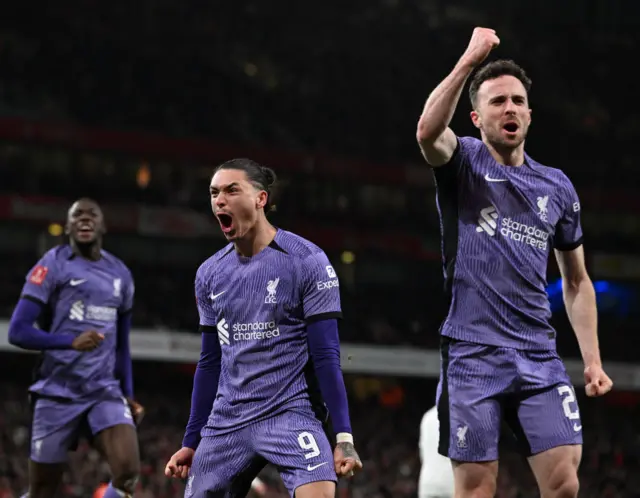 Jota, Nunez and Konate celebrate in front of the travelling fans at the Emirates.