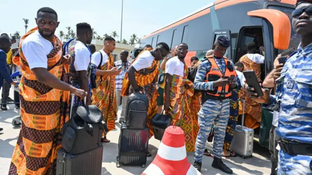 Ghana national football team players exit the Felix Houphouet-Boigny International Airport in Abidjan on January 10, 2024