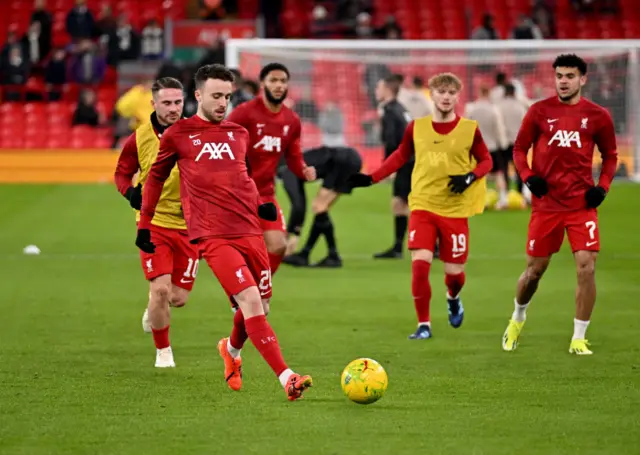 Jota plays the ball in the rondo during the Liverpool warm up.