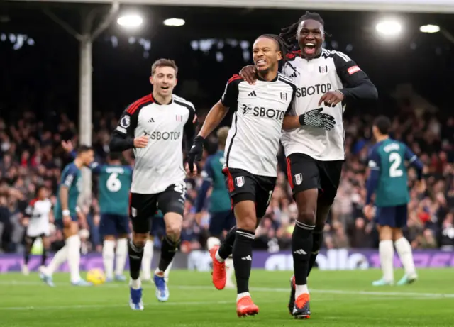 Decordova-Reid celebrates his goal v Arsenal with teammates.