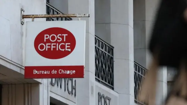 A pedestrian walks past a Post Office branch in London, Britain January 10, 2024