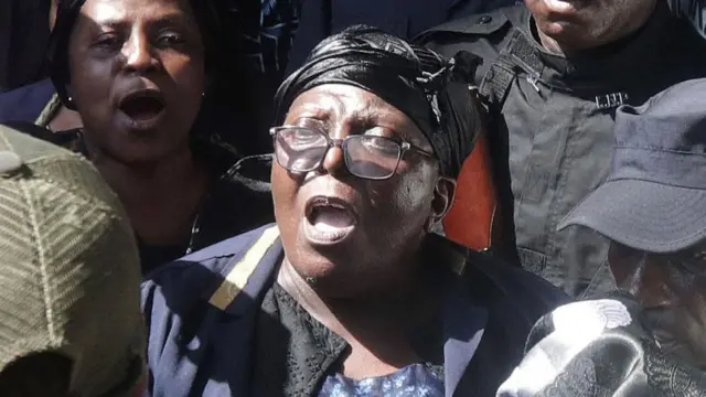 Liberia's former Chief Justice Gloria Musu Scott (C) reacts after being sentence to life imprisonment for murder, at the Temple of Justice on Capital Hill, in Monrovia, Liberia, 09 January 2024.