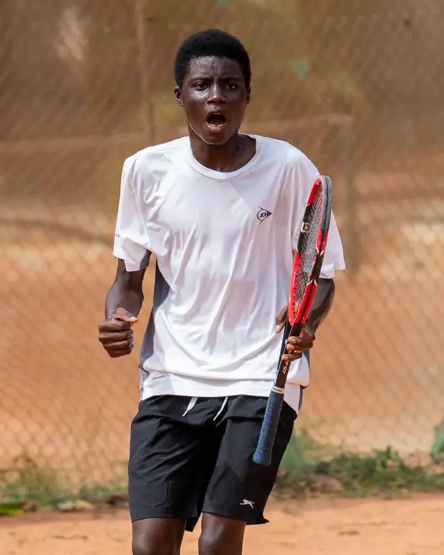 A tennis player in action, captured by Bernard Nii Bortey