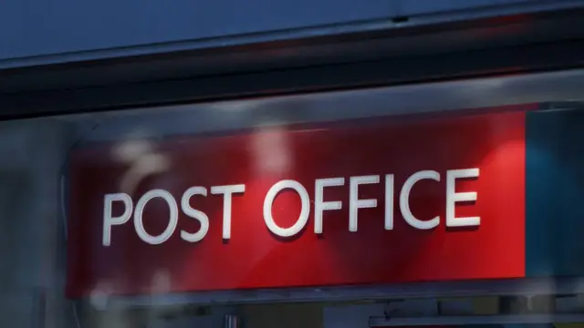 A Post Office sign sits at a shop window in London, Britain January 10, 2024