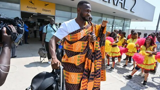 Ghana national football team players exit the Felix Houphouet-Boigny International Airport in Abidjan on January 10, 2024