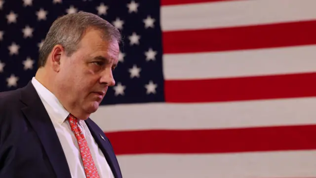 Chris Christie in front of an American flag